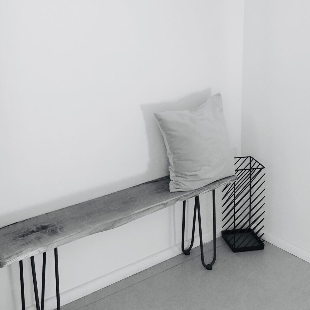 Changing room REALZ Pilates Studio Berlin, bench with cushion. Modern design.