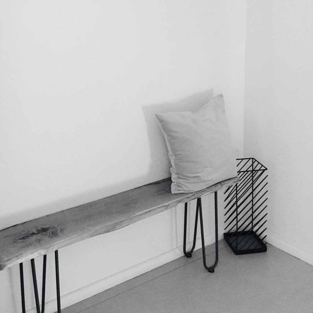 Changing room REALZ Pilates Studio Berlin, bench with cushion. Modern design. Let go of depression and come back to your real movement.